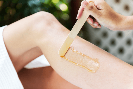 https://royalbeautyco.com.au/wp-content/uploads/2019/09/woman-getting-legs-waxed-at-a-spa-PFWLHKD.png